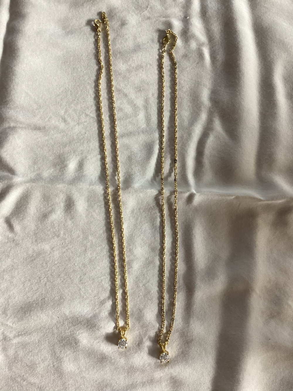 2 PC gold necklaces with silver charms